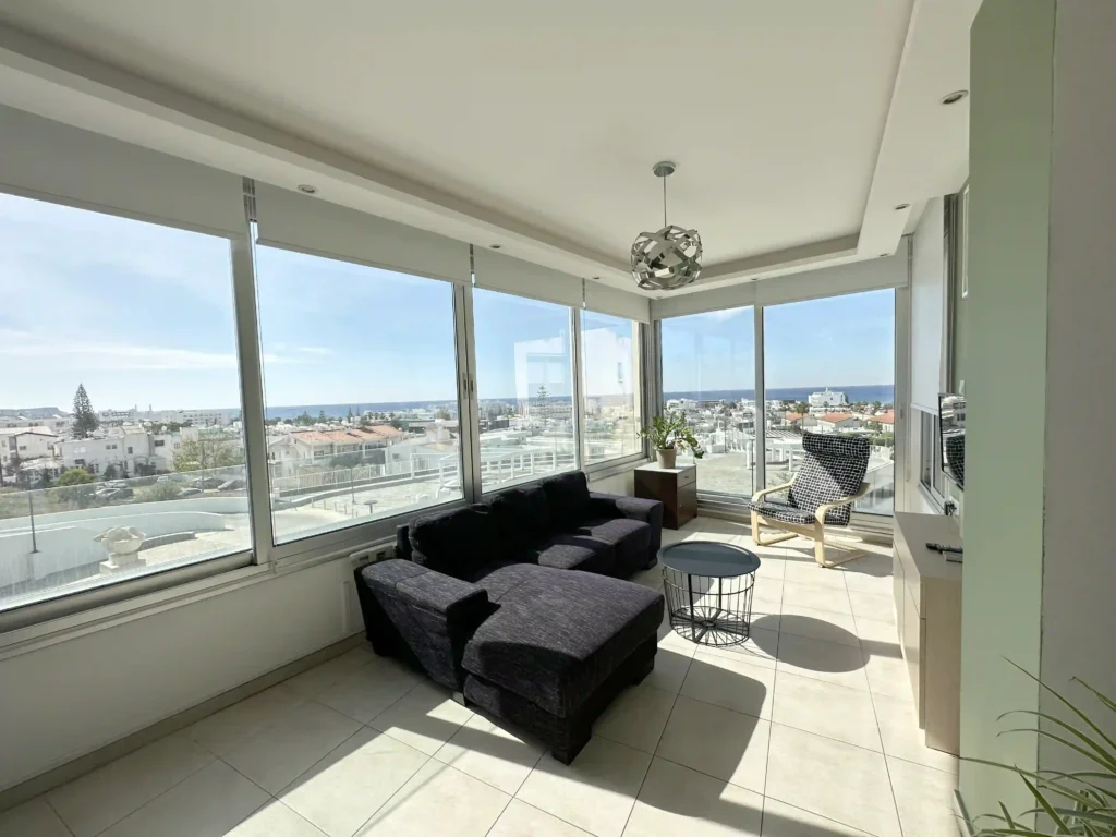 Bright and airy living room with expansive sea views in Ayia Napa, Cyprus.