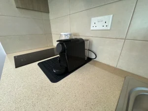 Nespresso Essenza Mini coffee machine in the Charming Central Apartment with Sea View Balcony, Ayia Napa, Cyprus.